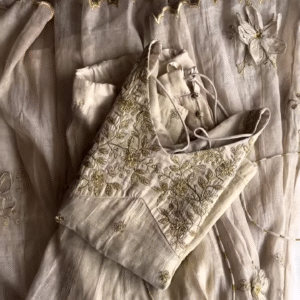 Elegant Ivory Hand-Embroidered Organza Lehenga Set